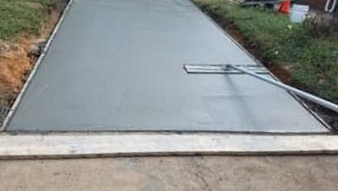 concrete walkway sidewalk by pacheco custom masonry and concrete in north carolina