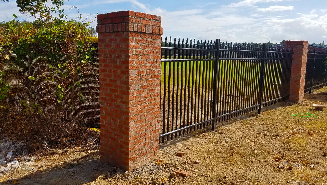 custom brick fence by pacheco custom masonry and concrete in north carolina