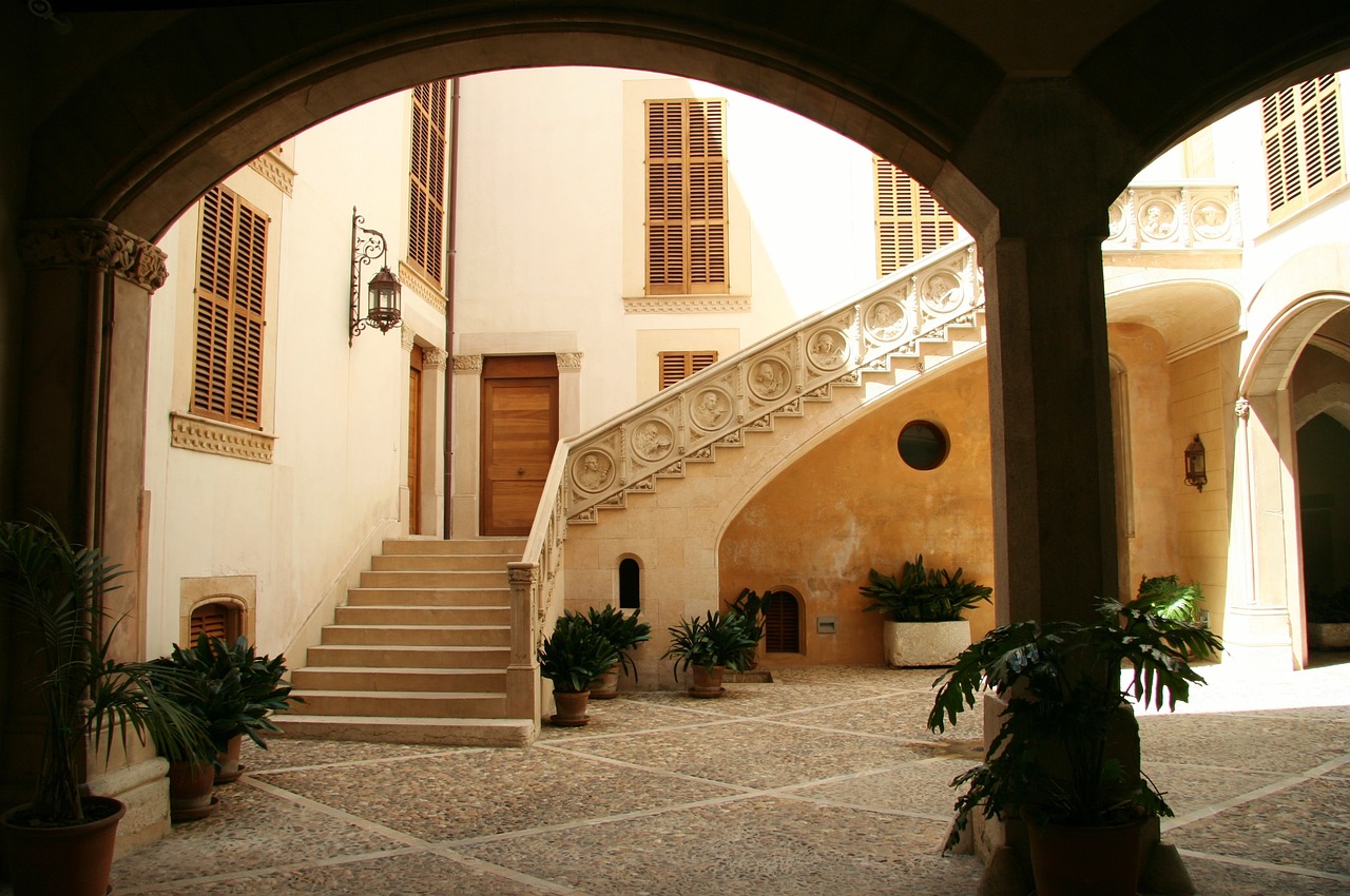 Elegant outdoor courtyard with custom masonry flooring and walls, showcasing the potential for a serene and stylish retreat.