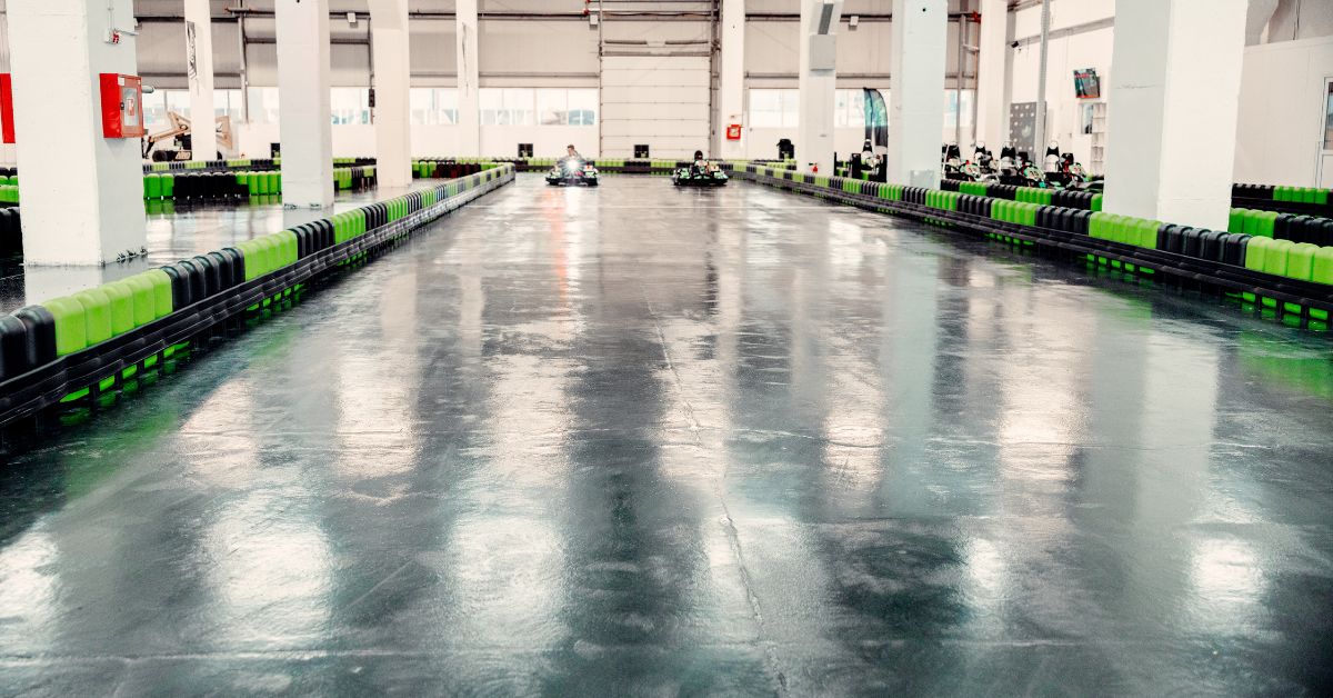 Photo of a clean and polished gokart track used for the post 'Best way to clean your epoxy garage floor'.