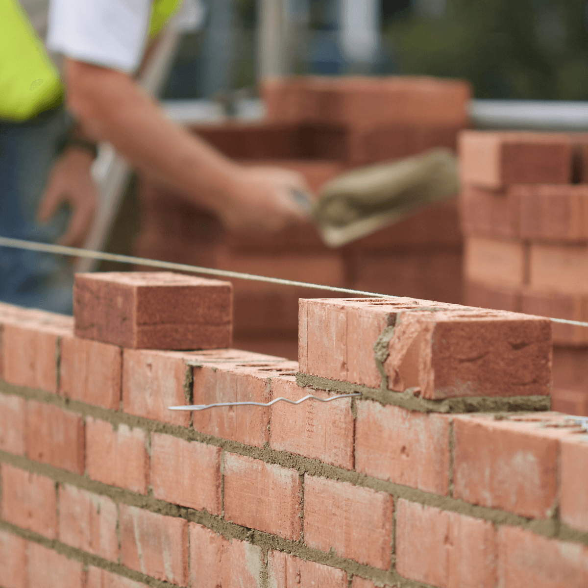 Pacheco's Custom Masonry repairing and building a custom designed brick mailbox